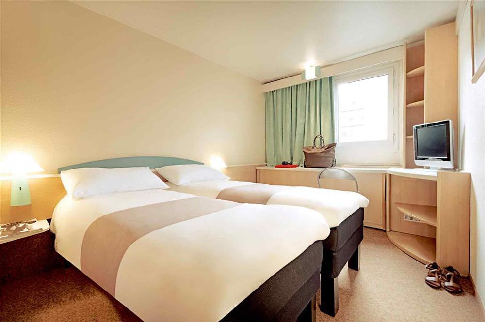 Ibis Lyon L'Isle D'Abeau Hotell Rum bild